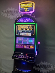 IGT GOLD BAR 7s PROGRESSIVE S3000 SLOT MACHINE WITH LIGHTED TOPPER 