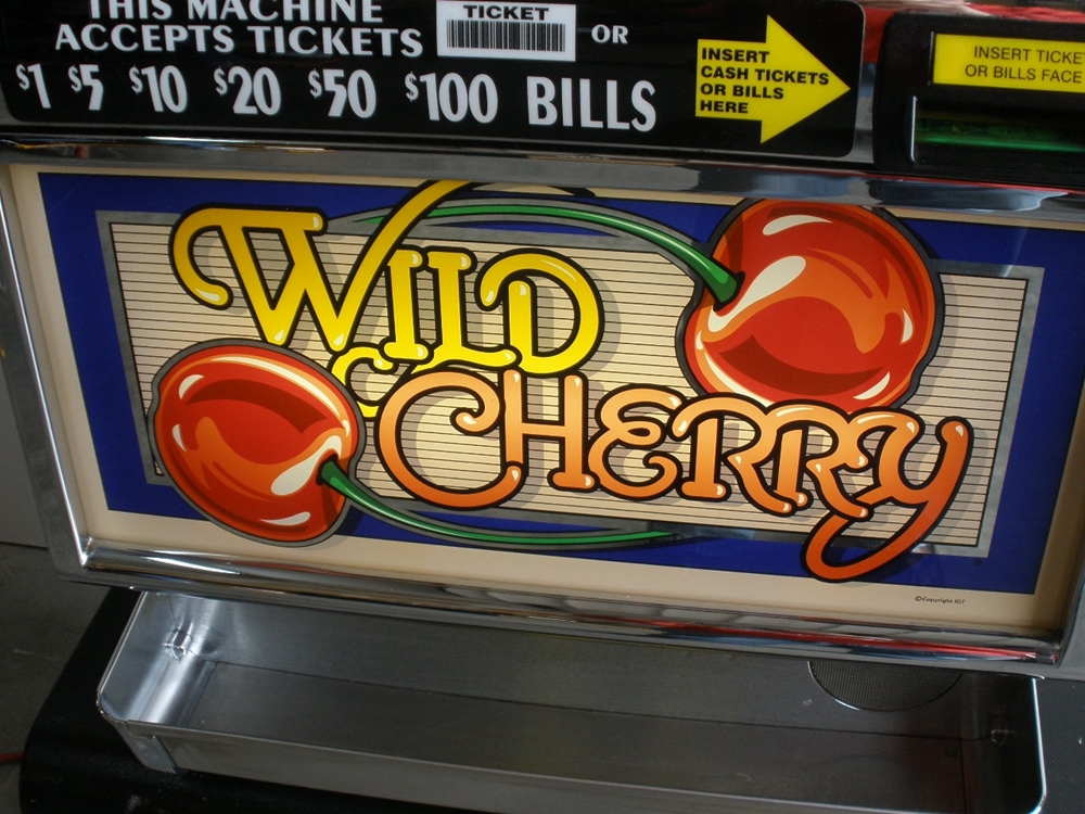 Sold at Auction: IGT Wild Cherries Slot Machine